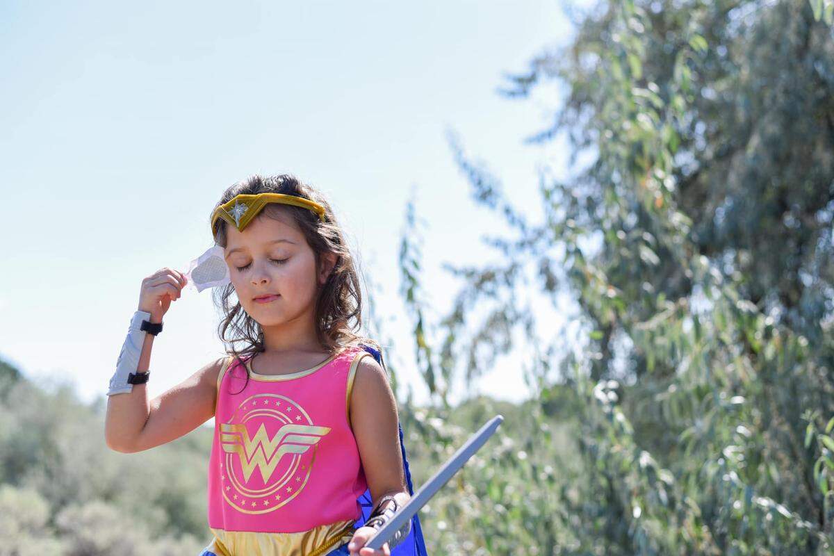 Aliyah Arambul takes off her eye patch one last time after wearing it for 2,646 hours.