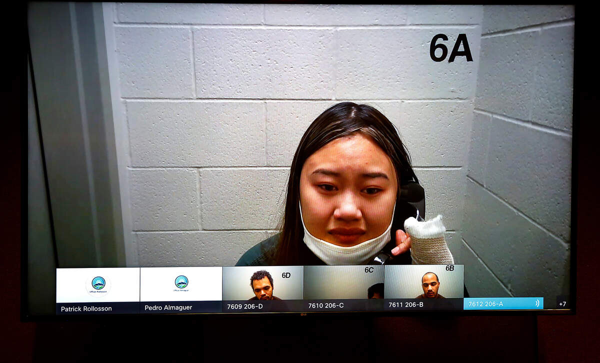 Jennifer Ana Duoung, 19, the alleged driver involved in a triple fatality wreck in Richland early Sunday, makes her preliminary appearance in Benton County Superior Court via remote video from the Benton County Jail.