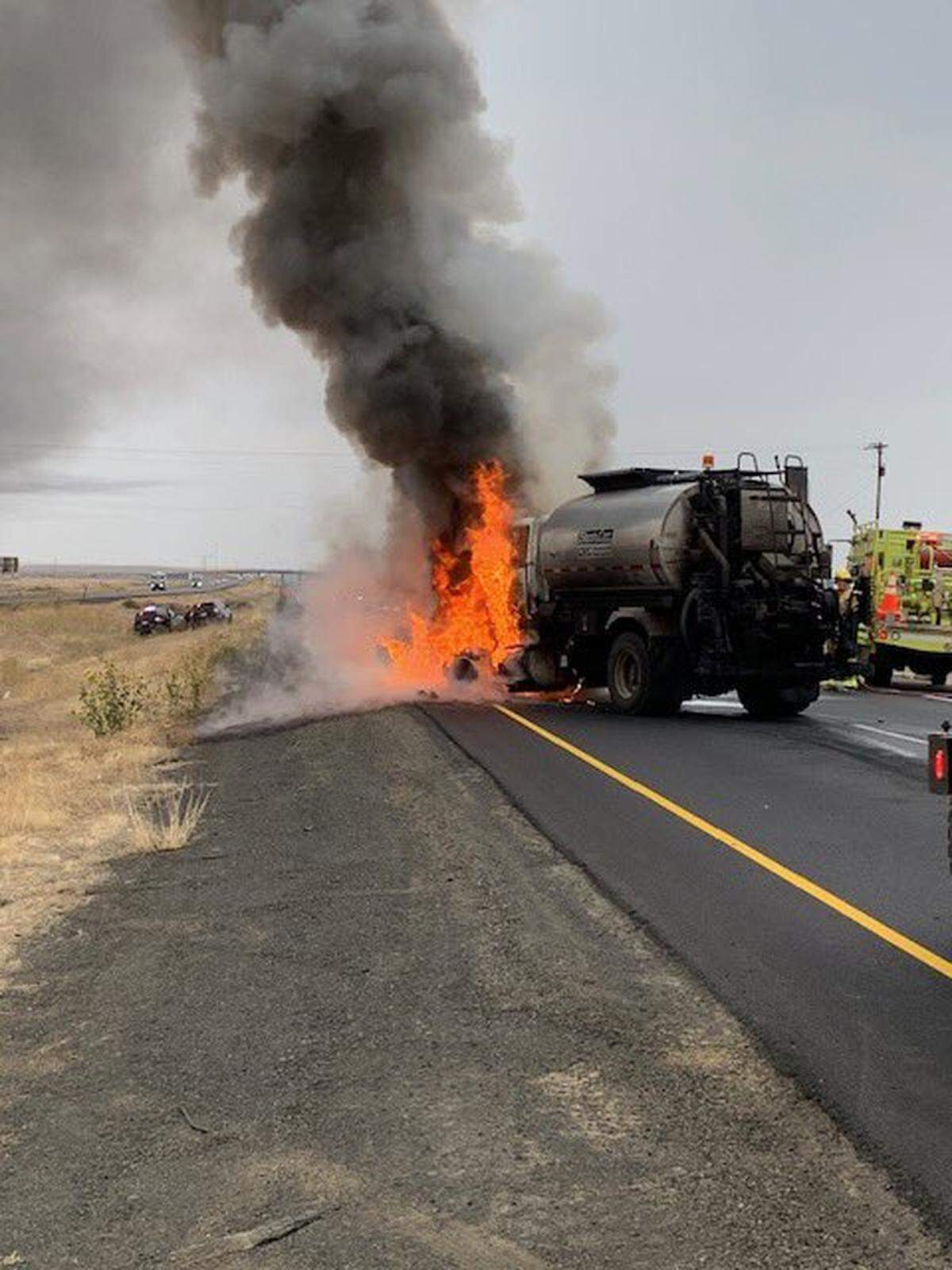 A chase stretching more than 30 miles ended with a Washington State Department of Transportation Asphalt truck bursting into flames on Interstate 90.