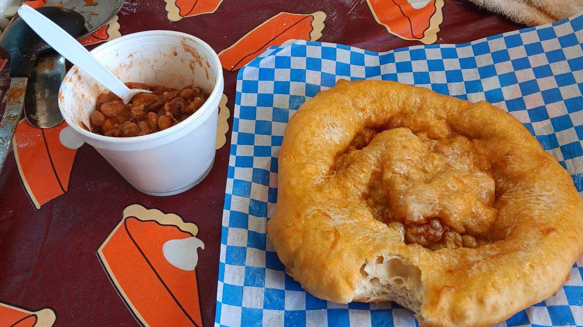 Fry bread with butter and homemade chili by Ernestine Jim