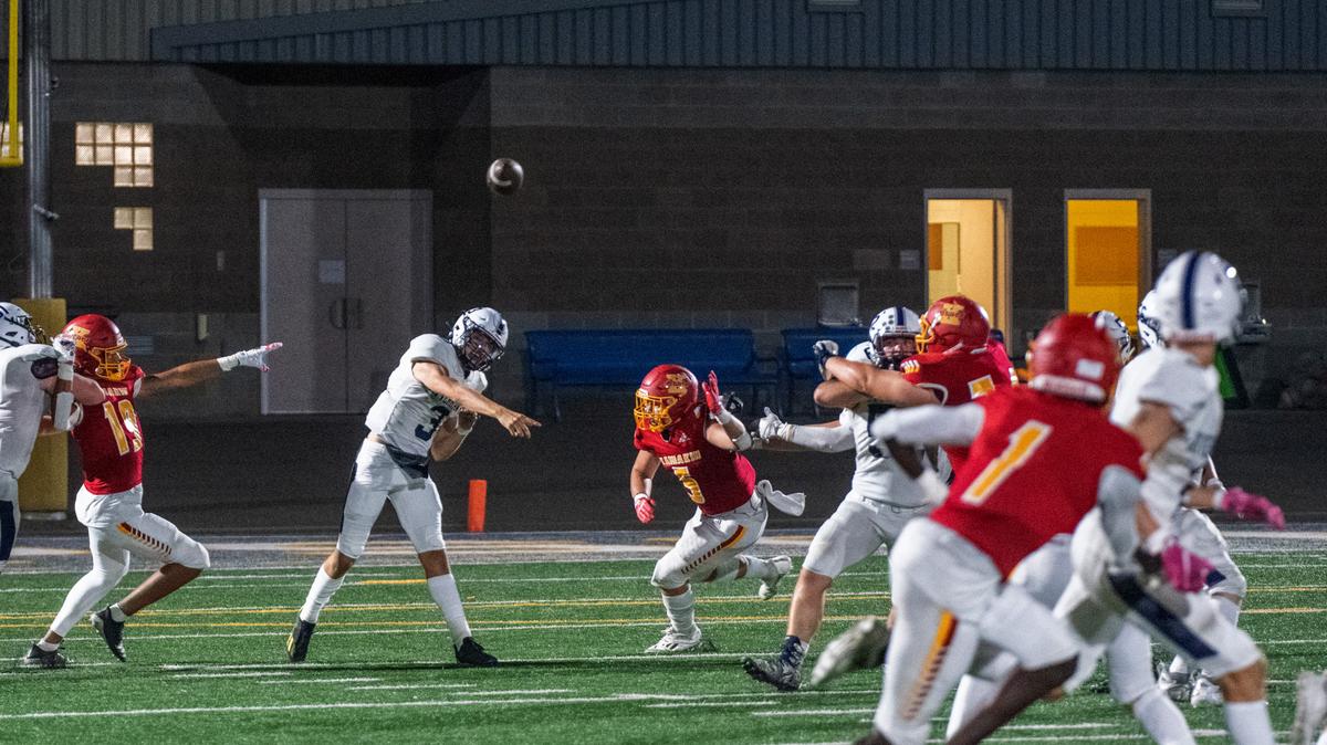 Chiawana’s quarterback DJ Duran throws a pass during his team’s 22-19 overtime win against Kamiakin High on Sept. 2.