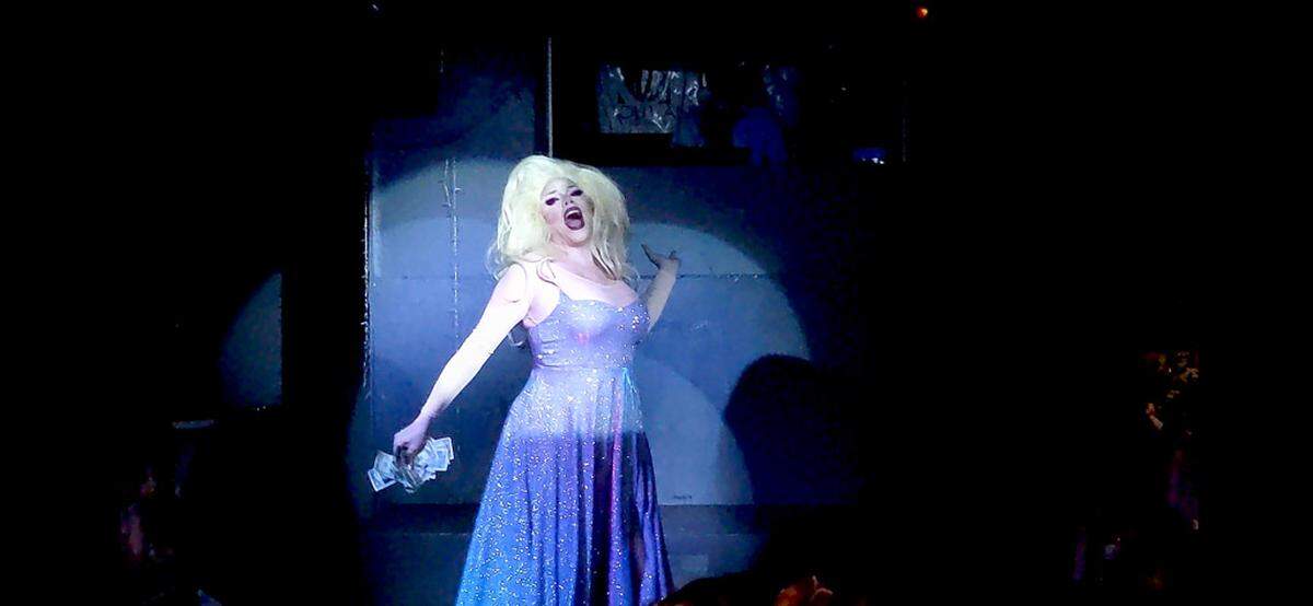 Hundred of people of all ages turned out Wednesday night for Out and About’s “All Ages Disney Drag Extravaganza.” The event featured Disney and Pixar songs lip synced by drag performers. 