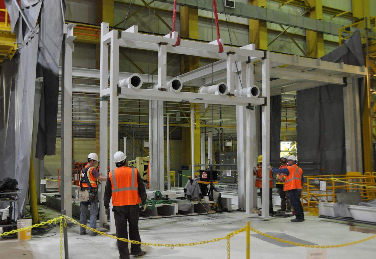 Hanford nuclear reservation workers set up a mock up of a Hanford facility that will be used to train on equipment and processes to remove 1,936 capsules of radioactive cesium and strontium from underwater storage.