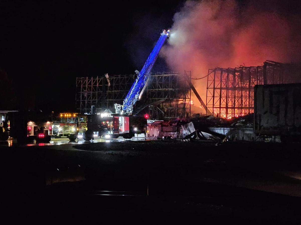 Flames flared up after a fire in 2024 at the Lineage cold storage warehouse in Finley, more than three weeks after the fire started. Drying, once-frozen vegetables were fueling the fire.