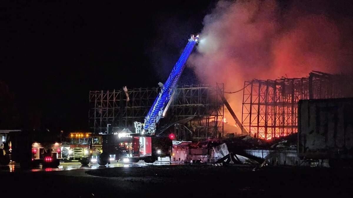 Flames flared up at the Lineage cold storage warehouse in Finley, more than three weeks after the fire started. Drying, once-frozen vegetables are fueling the fire.