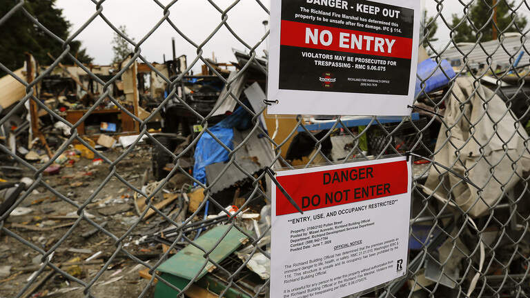 Can city now force tear down of burned-out Richland ‘junkyard’ house?