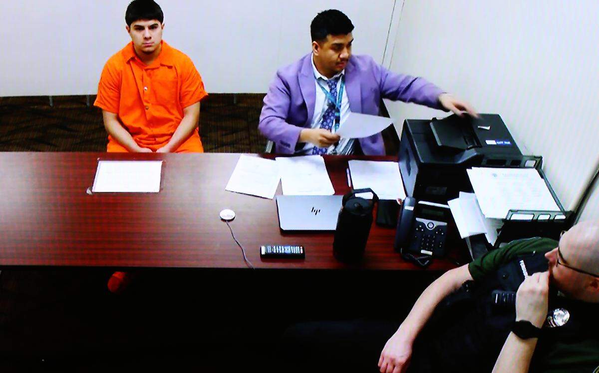 Vehicular homicide suspect Pedro Andres Ruiz, 18, of Othello, appears via a video in Franklin County Superior Court with defense attorney Micheal Anthoni Nguyen in Pasco.
