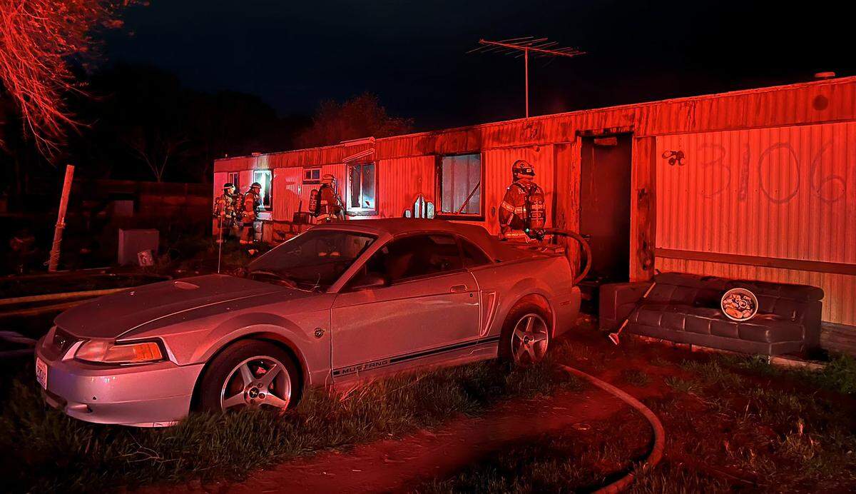 Firefighters from Benton County Fire District 1 and the Kennewick Fire Department extinguish a fire in  Finley. 