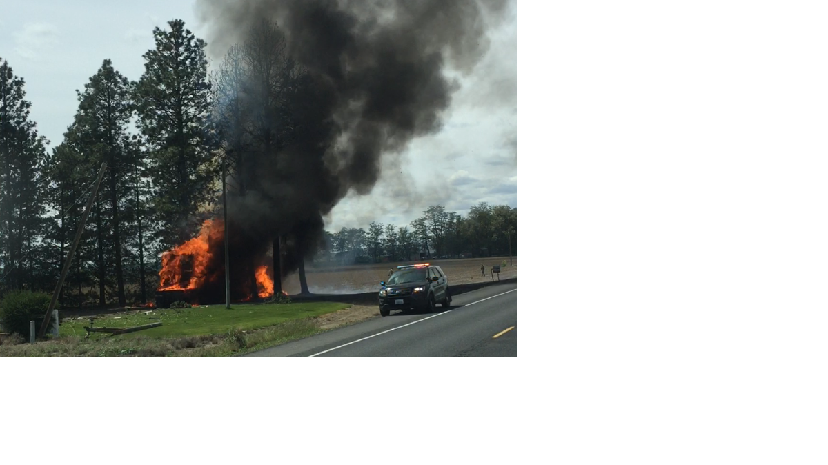 The semi-truck was engulf in fire after driving through a fence and power pole along Highway 17.