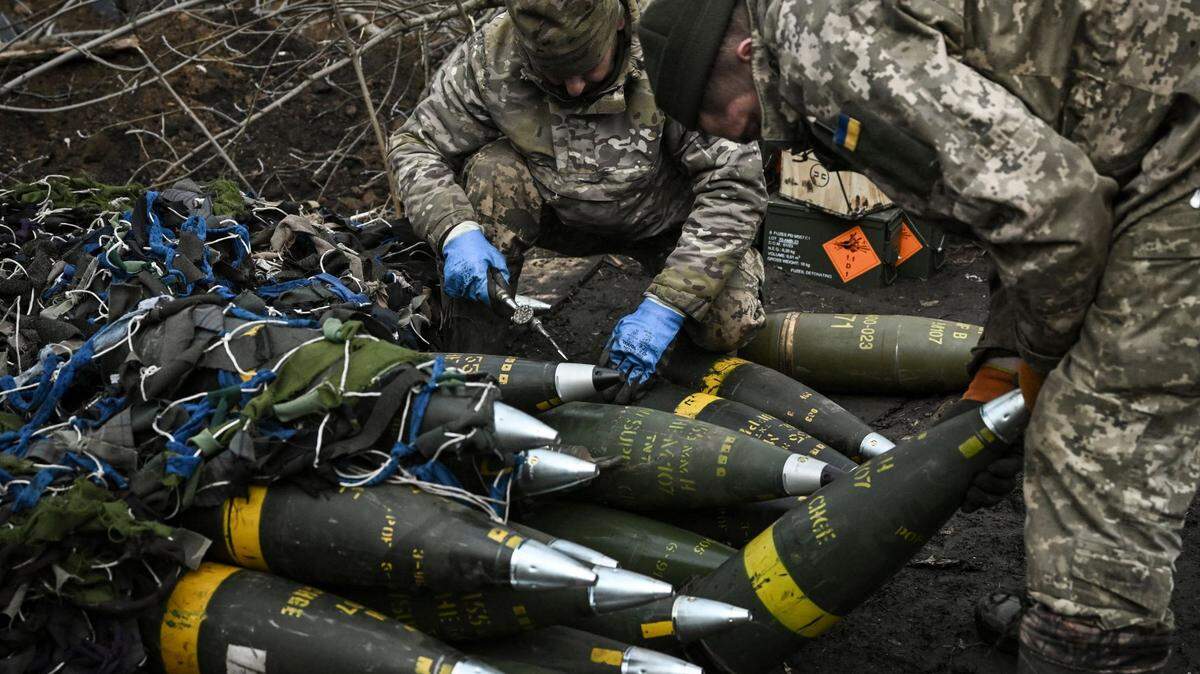 Ukrainian servicemen prepare to fire toward Russian positions with a 155mm M777 Howitzer artillery weapon on the front line somewhere near the city of Bakhmut on Saturday, March 11, 2023, amid the Russian invasion of Ukraine.