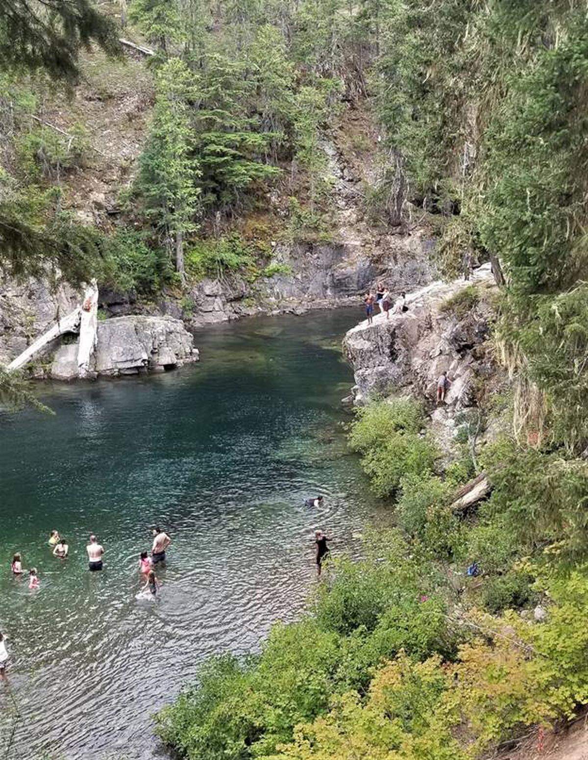Swimmers in the Cooper River at the Forest Service Salmon la Sac Campground.