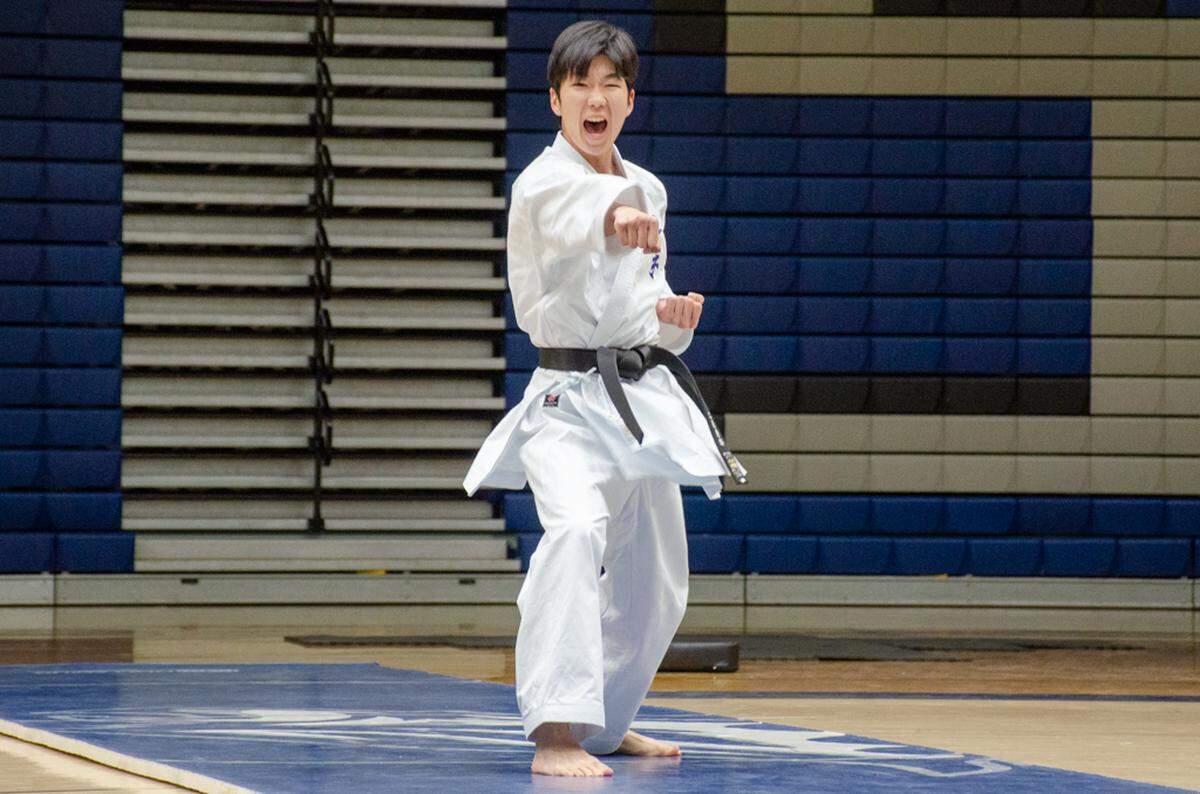 Yuuki Futami, a Yamate exchange student, demonstrates karate at Chiawana High School’s International Night.
