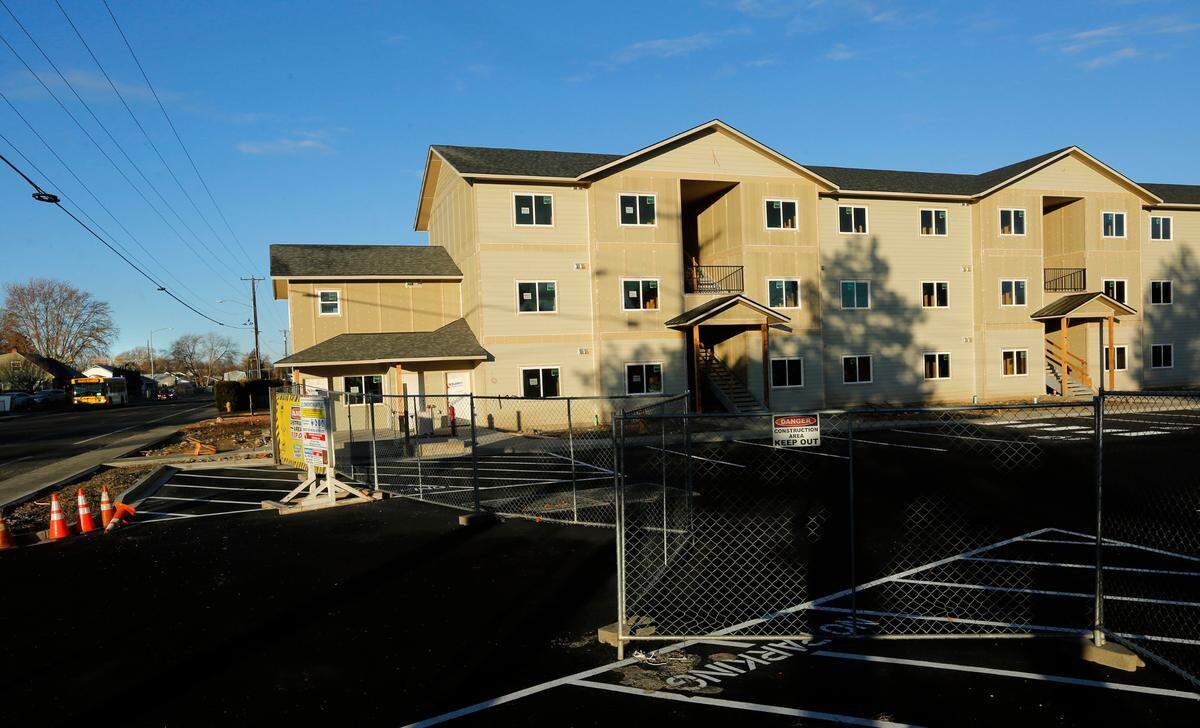 A estimated $1.4 million apartment complex, sandwiched between the Highlander Apartments and the income-restricted Brentwood Apartments on West Fourth Avenue in Kennewick, is still surrounded by construction fencing but appears to be nearing completion. The 25,800-square-foot, three-story complex will have 24 two-bedroom units and two studio apartments, according to building permits filed with the city. The property at 3120 W. Fourth Avenue was purchased several years ago for $402,000 by Jason Zook, the owner of Smile-A-Mile Painting. The new building is in the area behind Safeway just off Highway 395.