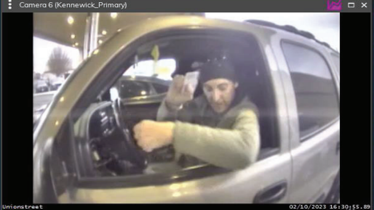 Levi Dennis, who pleaded guilty to bank fraud and aggravated identity theft, was caught in a Kennewick credit union security video.