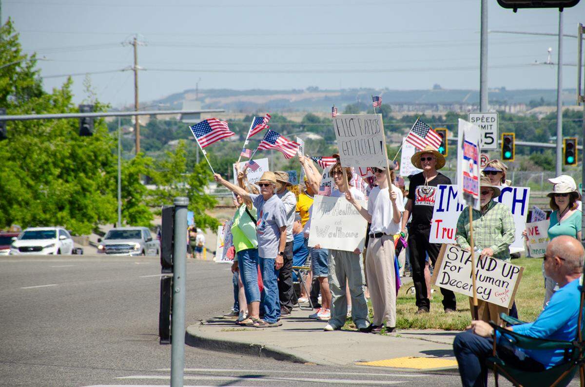 Thousands gathered Saturday, June 14, along Columbia Center Boulevard in Kennewick, Washington, for the nationwide “No Kings” protest. They demonstrated against President Donald Trump’s policies and against arrests made in the Hispanic community by U.S. Immigration and Customs Enforcement, or ICE.