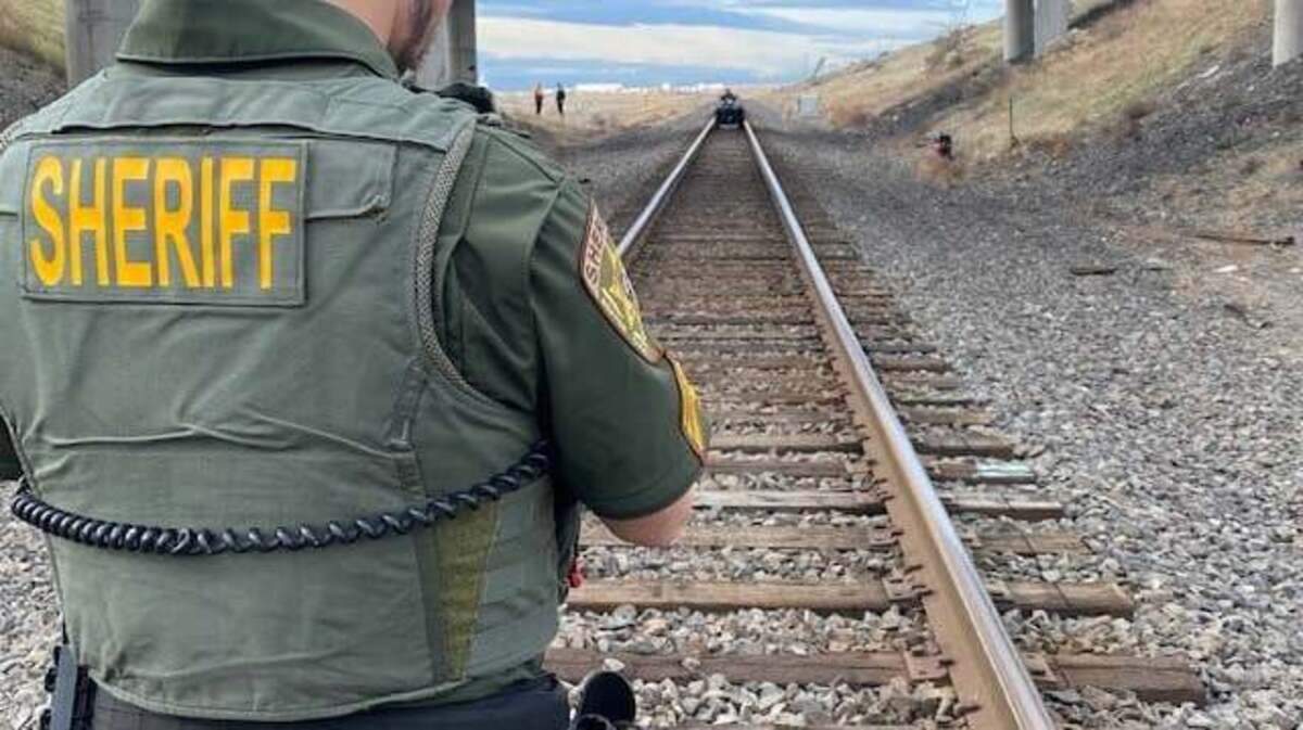 The body of a man was found by the railroad tracks near Interstate 82 and Highway 14 in Benton County on Tuesday morning.