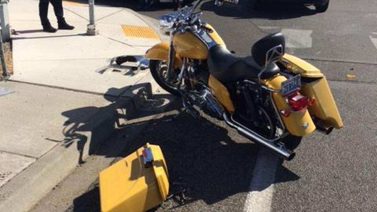 Kennewick police are on the lookout for a damaged red pickup and its driver after a hit-and-run crash Sunday with a motorcyclist.