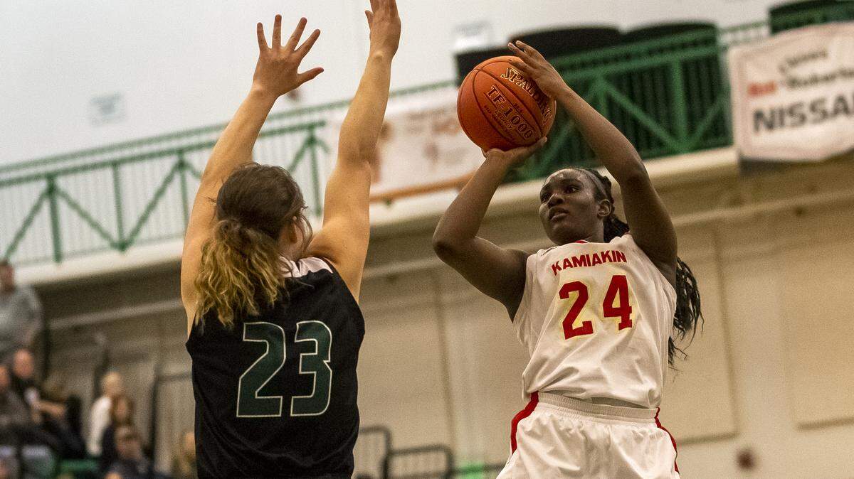 Kamiakin’s Oumou Toure shoots the ball during a 3A girls state regional game played in February at Richland High School.