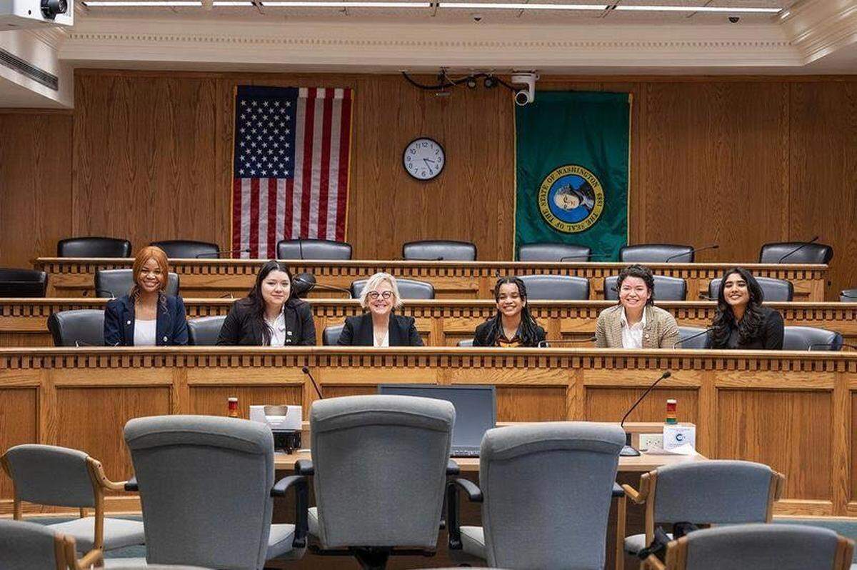 Richland High School junior Micah Fitzgerald, far left, poses for a photo with her fellow committee members in the Washington State Legislative Youth Advisory Council and state Sen. Claire Wilson, D-Auburn.