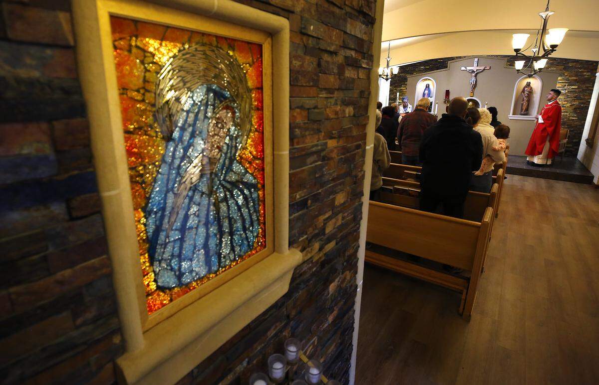 Rev. Cesar Izquierdo conducts a recent morning mass held in the chapel of the St. Rose of Lima Catholic Church in Ephrata.