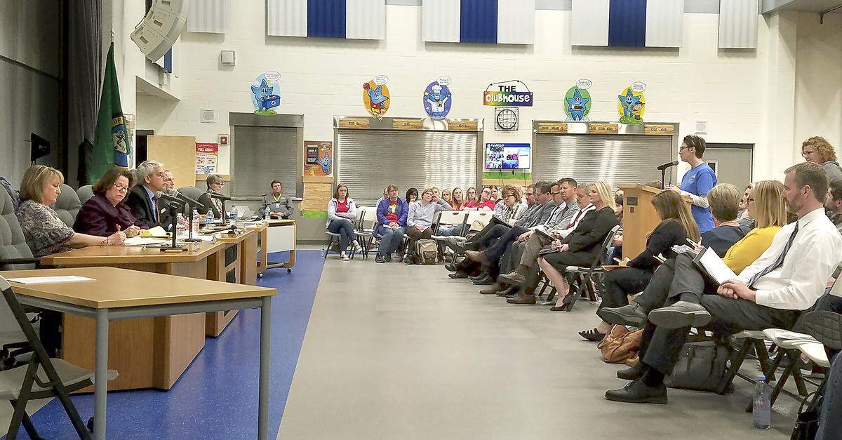 Parents, paraeducators and teachers spoke during a recent several hour long Richland School Board meeting at Marcus Whitman Elementary. More than 500 people attended the meeting.