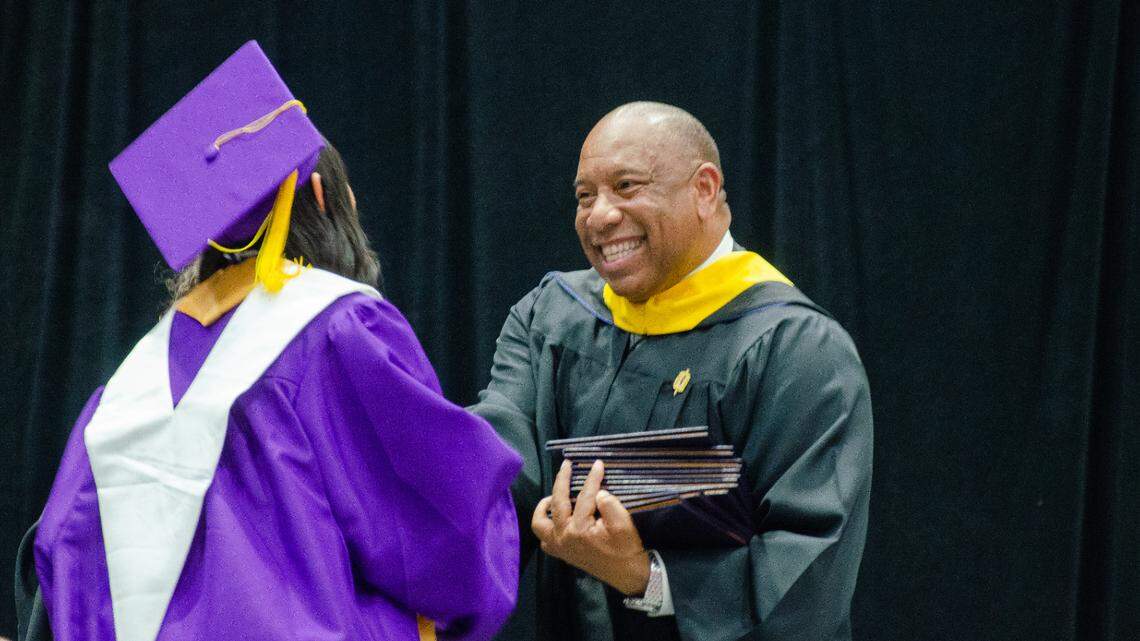 First-term Richland School Board member Semi Bird hands out diplomas earlier this year at the 2022 Hanford High School graduation ceremony in Kennewick, WA.