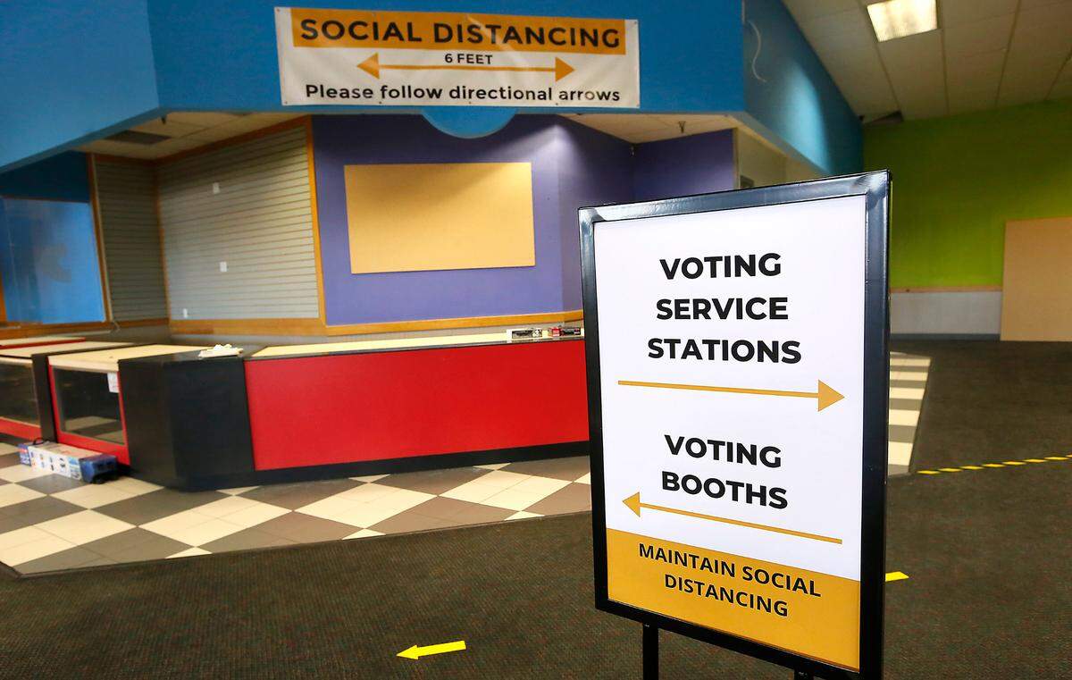 Numerous signs and arrows on the floor will help direct the flow of people in the Benton County Voting Center in the former Chuck E. Cheese restaurant in Richland. Watch a video at: tricityherald.com/videos