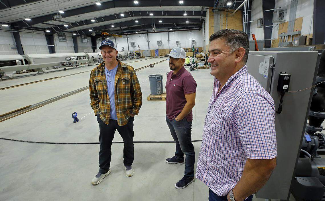 Vice president of operations Bryan Eeles, customer service manager Tony Ramirez and president Rene Collin, from left, stand inside the new facility.