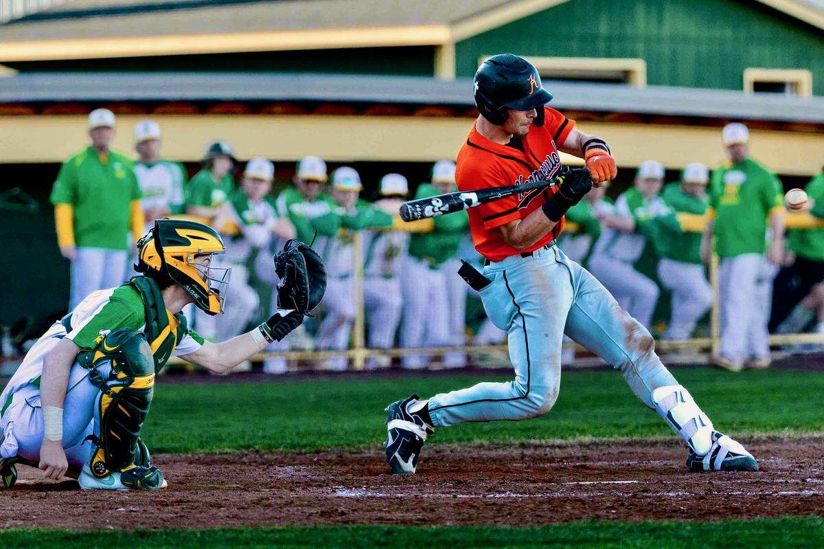 Kennewick’s Bradley Parker hits a line drive to center field during a game against Richland in March.