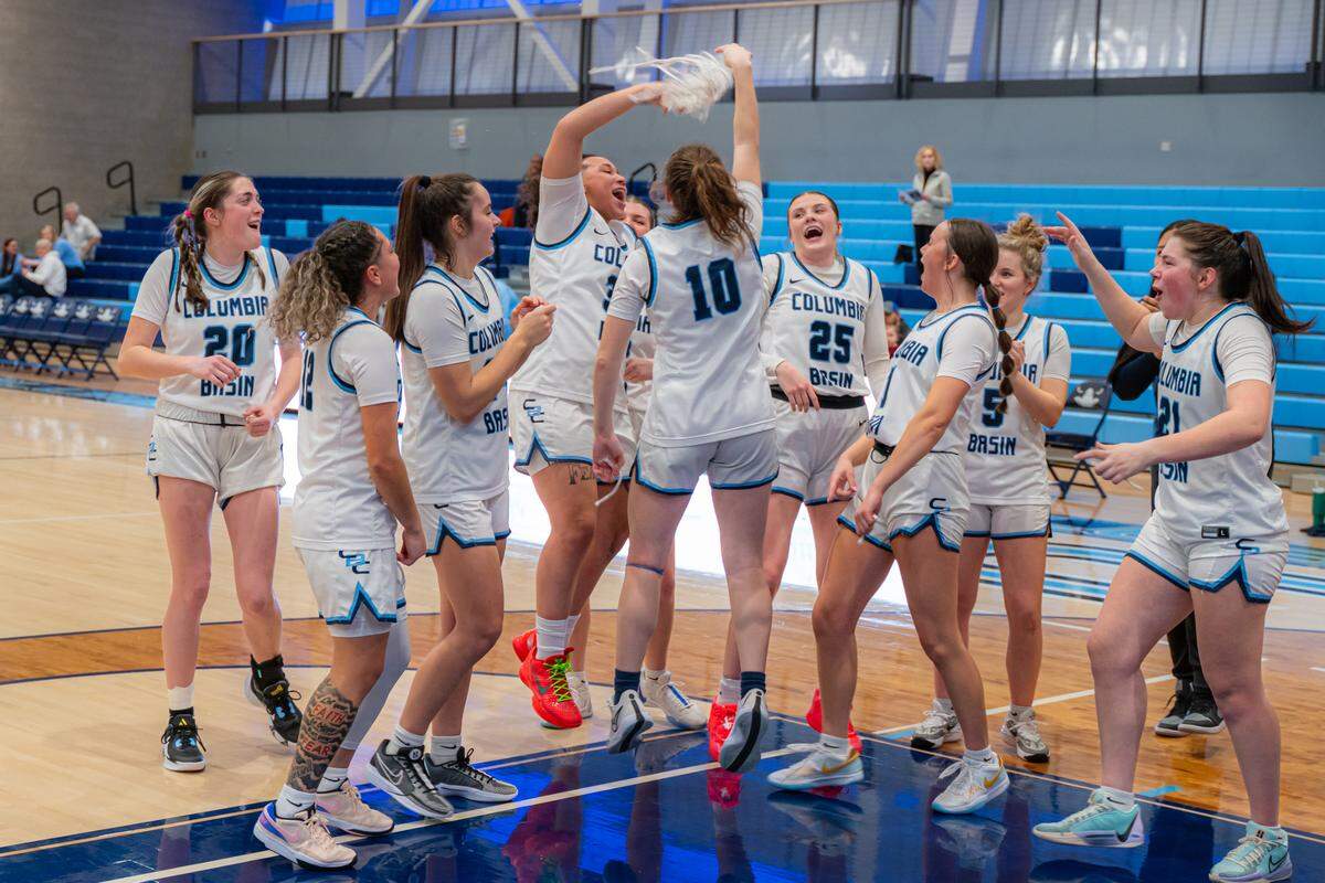 The Columbia Basin College women’s basketball team celebrates in 2024.