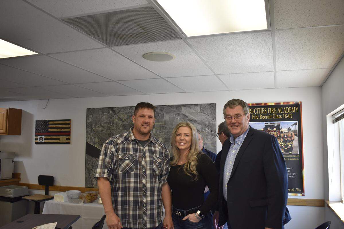 Kennewick city employee Cam Magelsen was recognized for his efforts to save a jogger who had a heart attack.