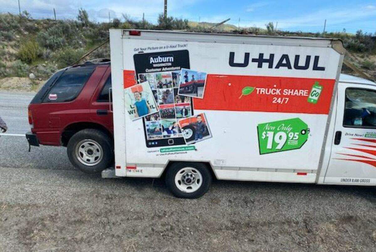 Washington State Patrol Trooper John Bryant posted this photo a U-Haul driver with a SUV loaded in the back.