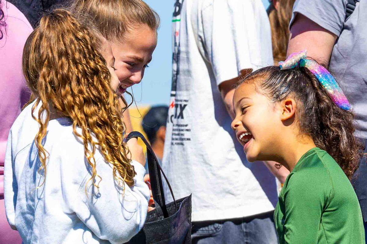 Children laugh during the Middleton Farms Easter Egg Drop.