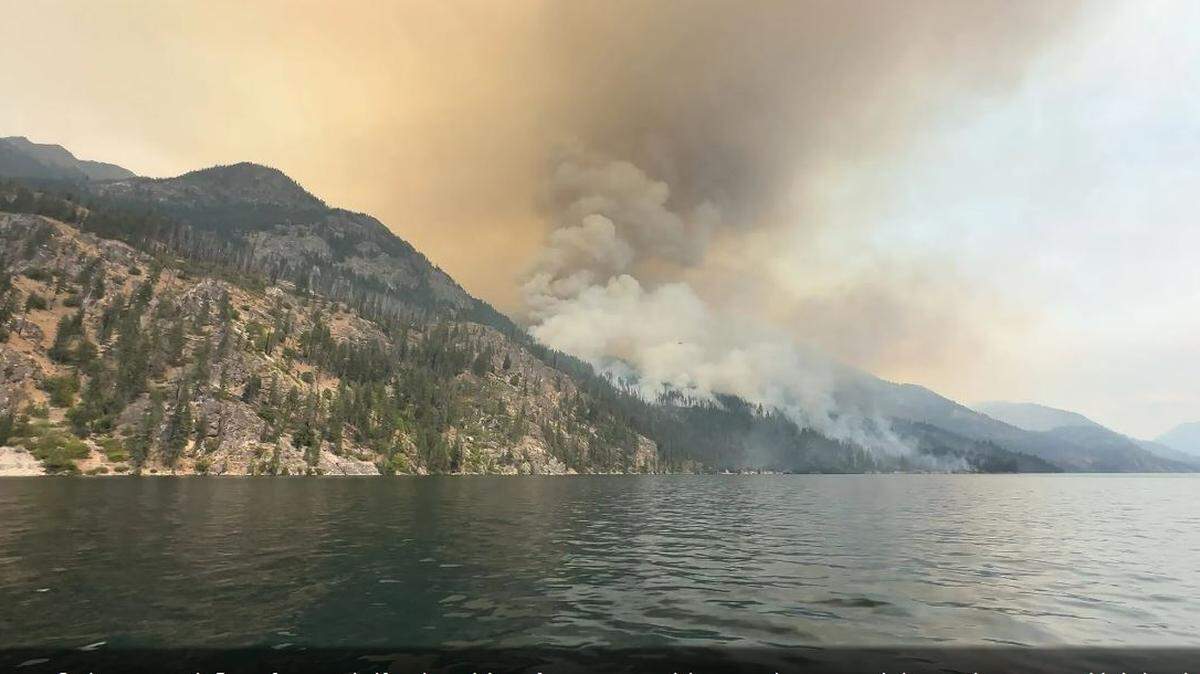 The resort town of Stehekin was under an urgent evacuation notice Sunday morning as the Pioneer fire approached from the south. Law enforcement estimated about 80 residents remain in the boat-in-only community and don’t plan to leave.