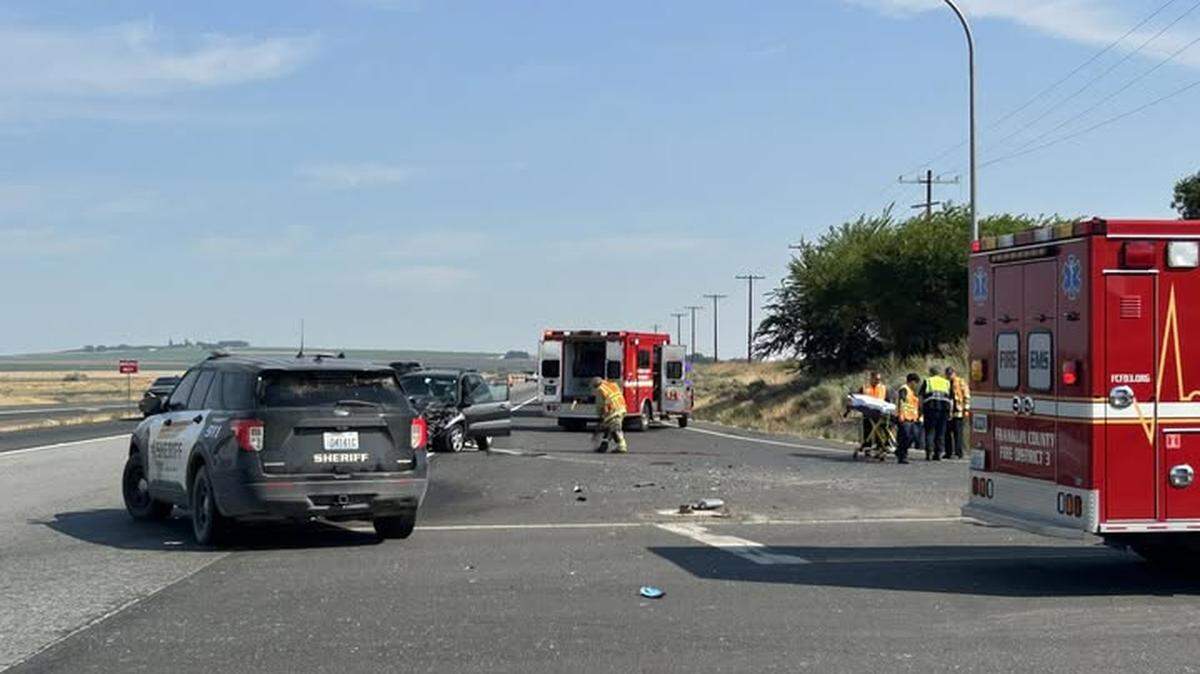 One person died and two others were injured in a Highway 395 crash near Country Mercantile Sunday morning, according to initial reports.