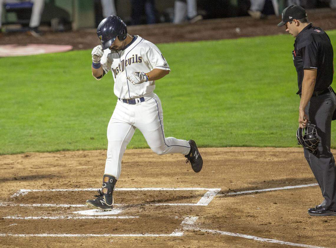 The Tri-City Dust Devils in Pasco could lose its affiliation with the MLB under a national proposal to cut 42 farm teams. Dust Devils player Matthew Acosta (6) hit a two-run home run during Game 4 of the Northwest League playoff finals at Gesa Stadium this season.