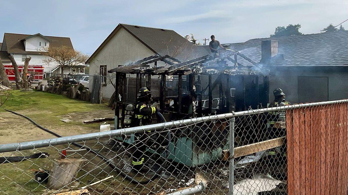 Pasco firefighters extinguish a burning chicken coop at about 3 p.m. Sunday on the 1200 block of South Fourth Avenue about 3 p.m., according to a release from the Pasco Fire Department.