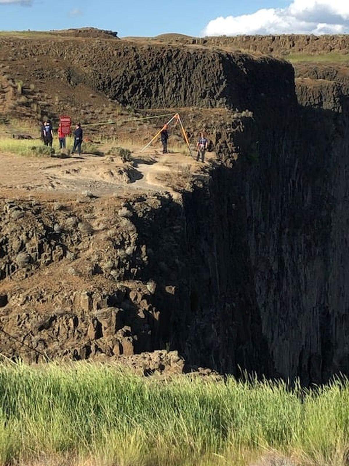 Emergency crews with Franklin County Fire District 3 and other agencies work to rescue a hiker at Palouse Falls.