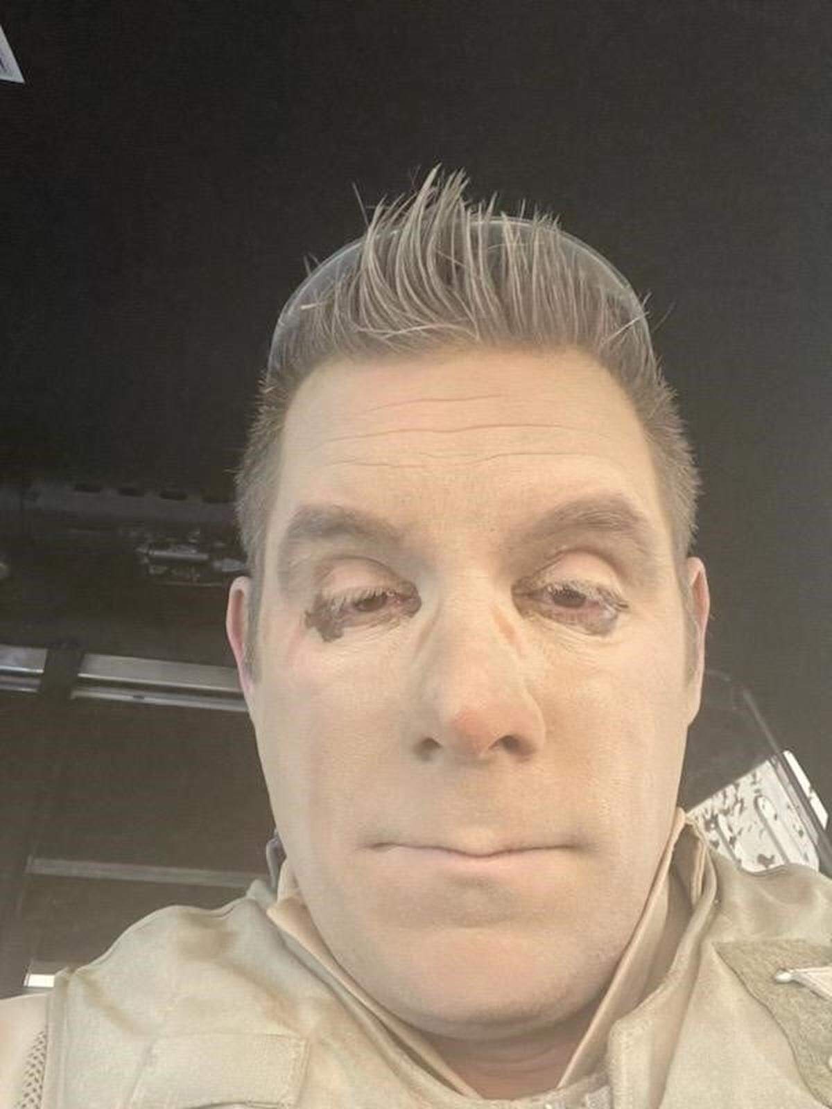 Benton County Deputy James Leingang was covered in dirt after working at an accident scene Sunday.