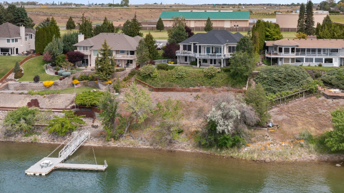 Docks are rare on many miles of Tri-Cities shoreline. This home is a stunning exception