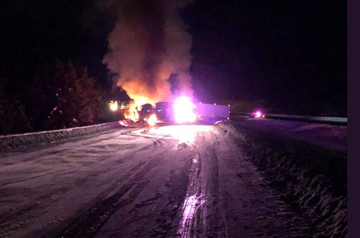 Two semi trucks caught on fire in a three-truck crash on Interstate 84 west of La Grande, Ore., Wednesday night.