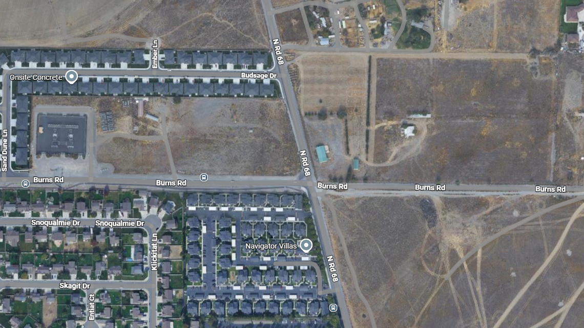 Man accused of holding kids at gunpoint for sliding down a Pasco roof