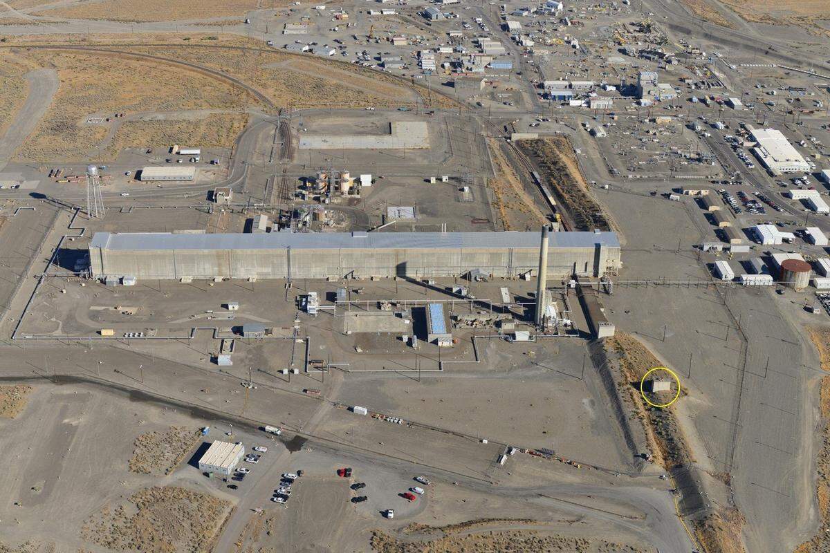An aerial view of the PUREX processing plant shows the building, circled in yellow, where steam was seen Friday morning. The building is at the start of a 1,700-foot-long waste storage tunnel. The shorter waste tunnel next to it had a partial collapse in May 2017.