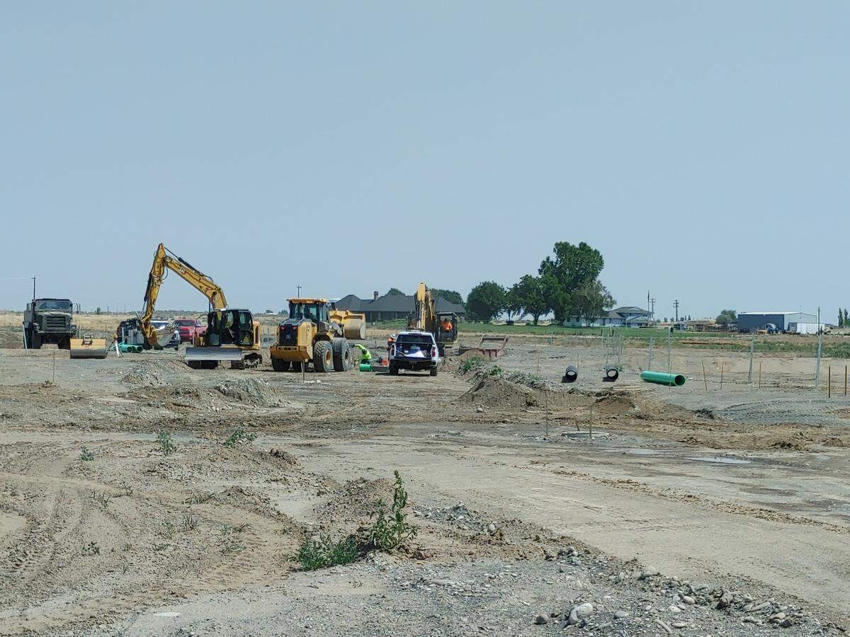 Contractors continue to prepare property along the 11600 block of West Court Street in Pasco for Columbia Shores,.