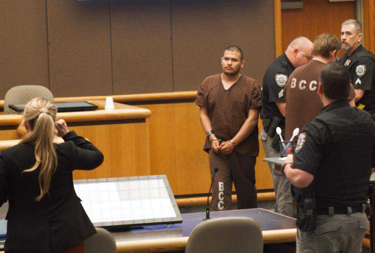 Hector Munguia, 18, walks into Benton Franklin Superior Court on April 26 and is facing a murder charge for killing his neighbor. Two years earlier he was convicted of wounding a woman during a robbery attempt.