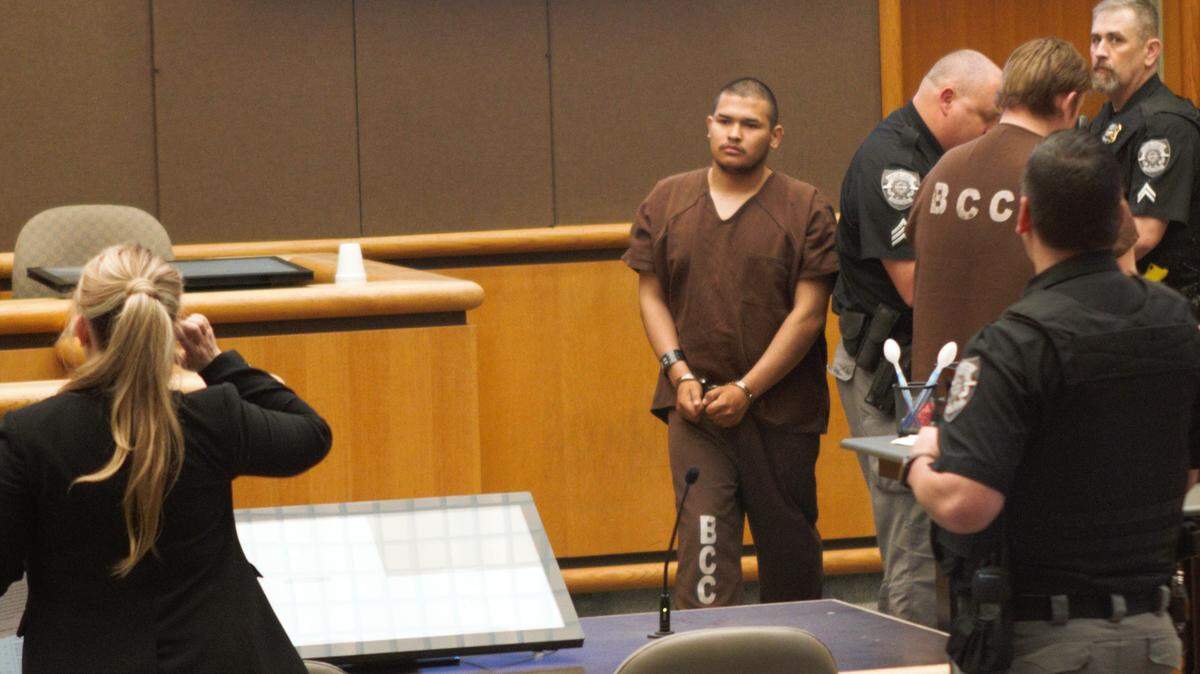 Hector Munguia walks into Benton Franklin Superior Court on Tuesday, April 26, 2022. Munguia is accused of killing his neighbor.