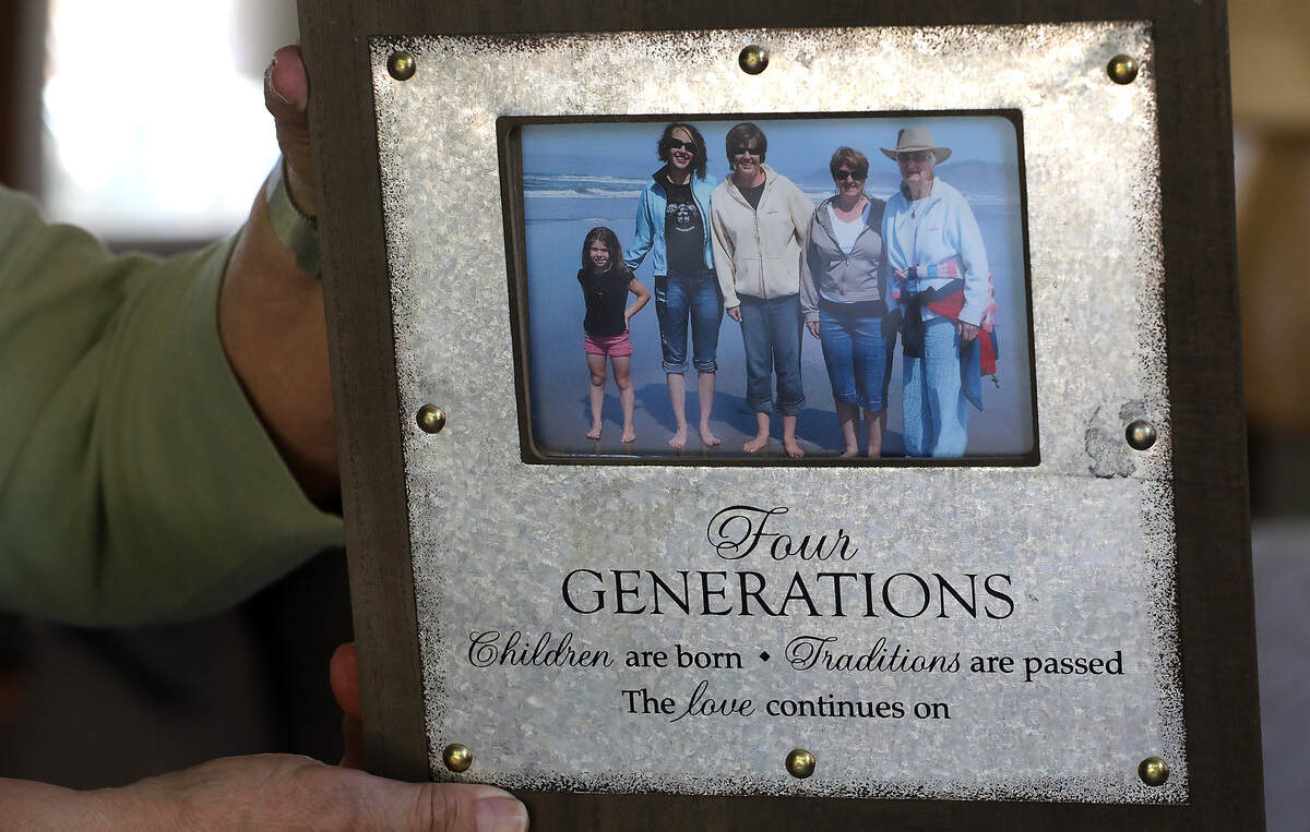This family photo was taken during a family vacation on the beach of the Oregon coast.