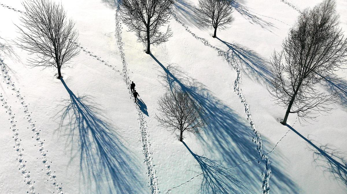 Gayleen and Mark Cano of Kennewick embark through the shadows provided by Tuesday morning’s ample sunshine on a brisk outdoor adventure to hike snow covered Badger Mountain in Richland. The rejuvenating warmth from the sun helped little to offset the chilling winds arriving in the Tri-Cities from the north. One to two mores inches of snow is possible Wednesday, particularly between dawn and 10 a.m., according to the National Weather Service. It also predicts three to five inches of new snow Wednesday night, with another inch or two Thursday. Watch a drone video at: tricityherald.com/video