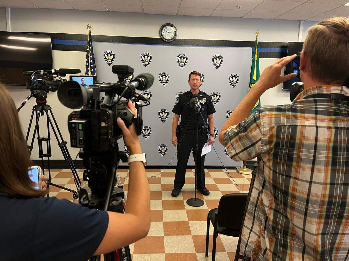 Richland police Lt. Damon Jansen meets with the press about the stabbing early Wednesday at home on Cosmic Lane. One woman died and another man was injured.