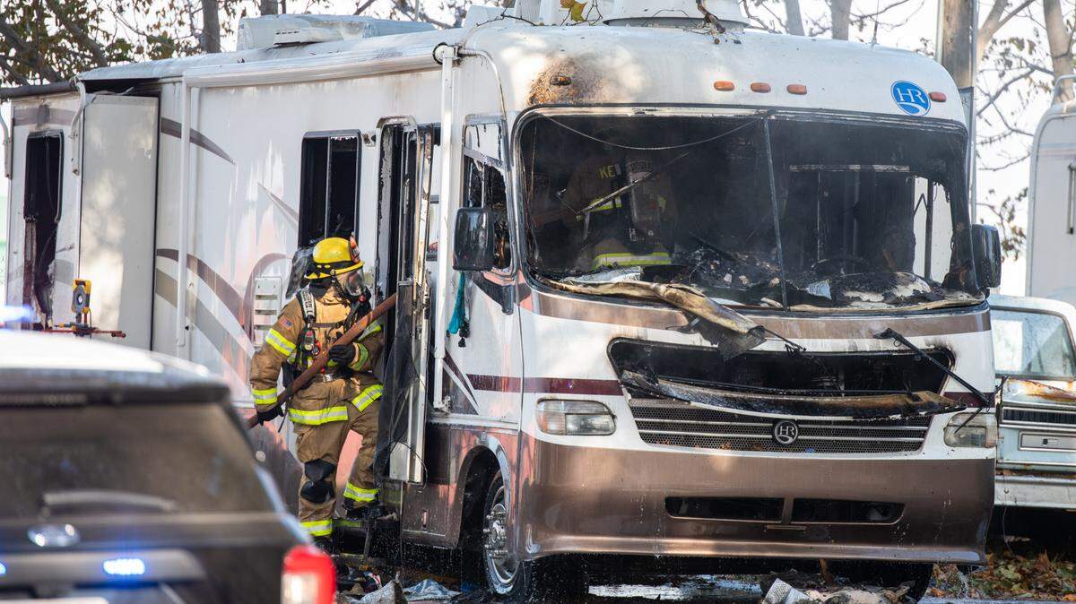 Kennewick firefighters work to extinguish an RV fire at 7322 W Bonnie Ave. on Saturday morning that critically injured an 8-year-old girl and her 14-year-old brother.